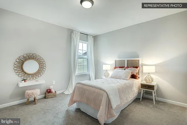 a bedroom with bed and a window