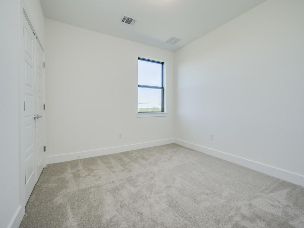 12327 Maypole Bend Austin, TX 78717 - Photo 26 of 30 an empty room with a window