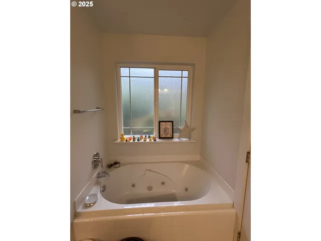 a bathroom with a bathtub