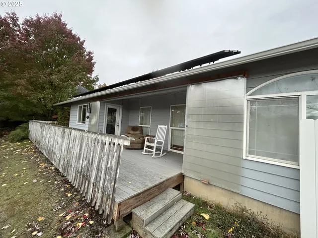a view of backyard with deck