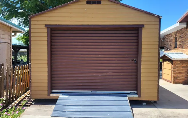 a room with lots of furniture and baby crib