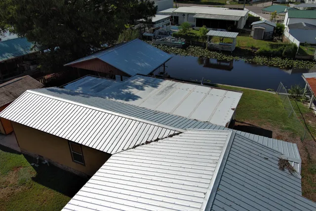a view of a street with a potted plants