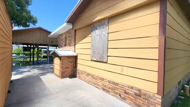 a view of a house with a street