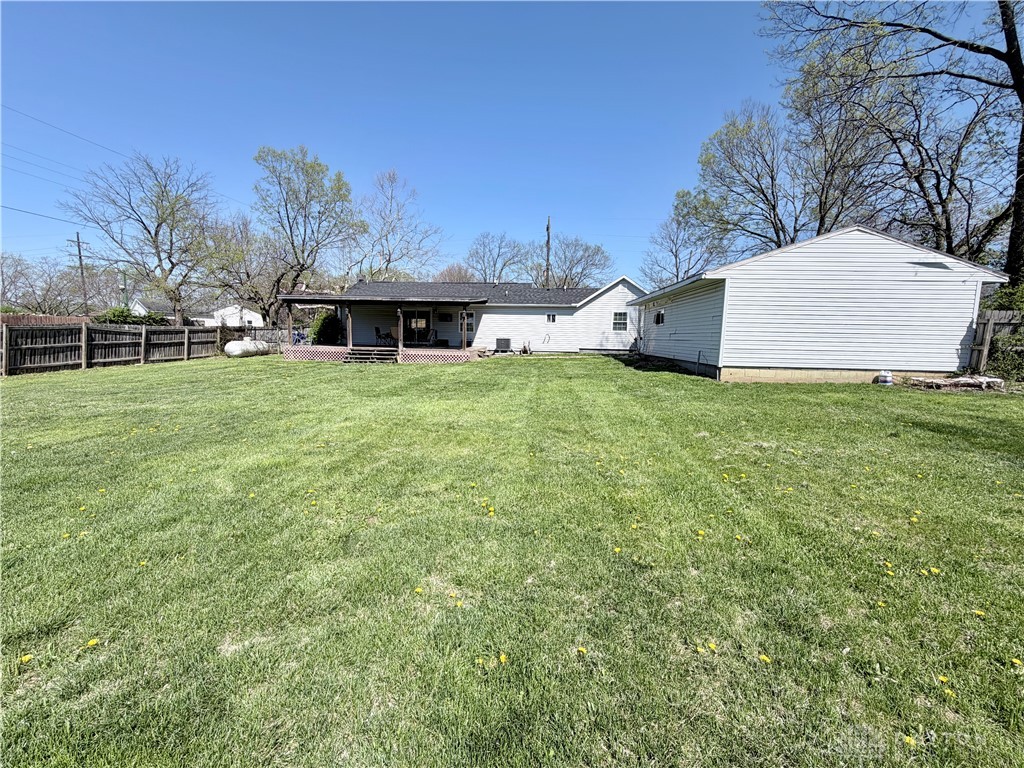 6800 Farmington Road Miamisburg, OH 45342 - Photo 27 of 32 This residence features a fenced yard, offering a spacious outdoor area for recreation and relaxation.