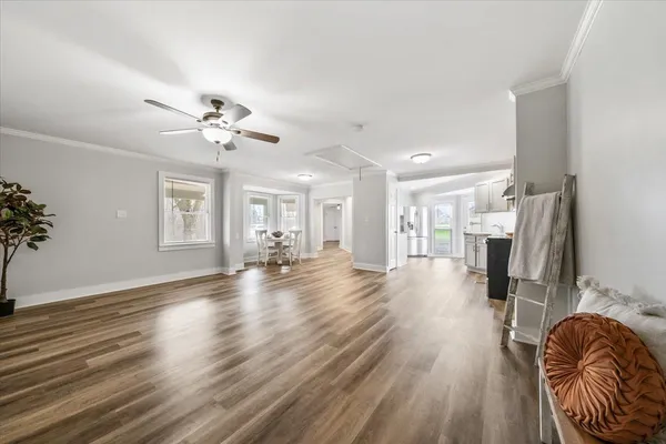 a view of livingroom and hardwood floor