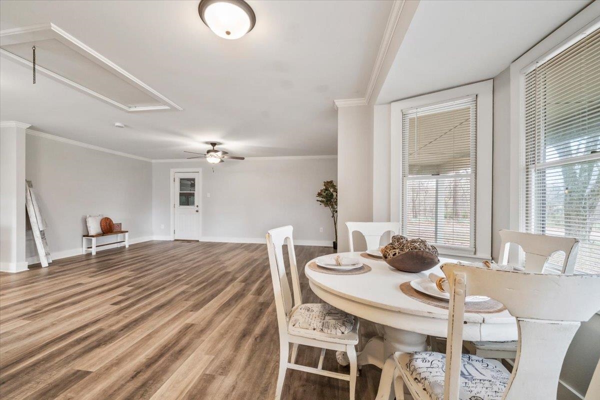 145 Quail Road Covington, TN 38019 - Photo 8 of 33 a dining room with furniture and window