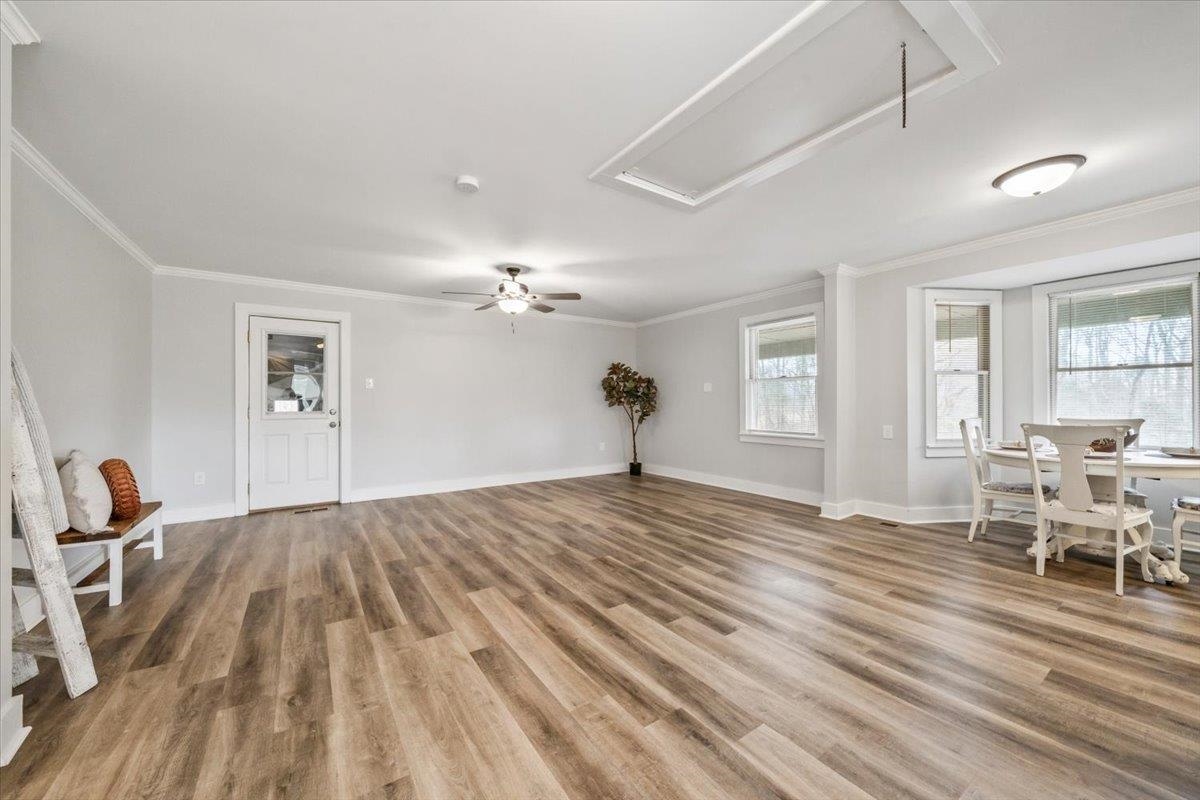 145 Quail Road Covington, TN 38019 - Photo 10 of 33 a view of a livingroom with furniture and wooden floor