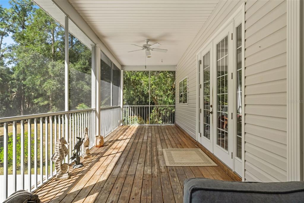 4270 Southeast 193rd Place Yankeetown, FL 34498 - Photo 25 of 42 a view of balcony with wooden floor