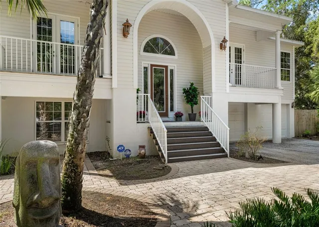 a view of a backyard of the house