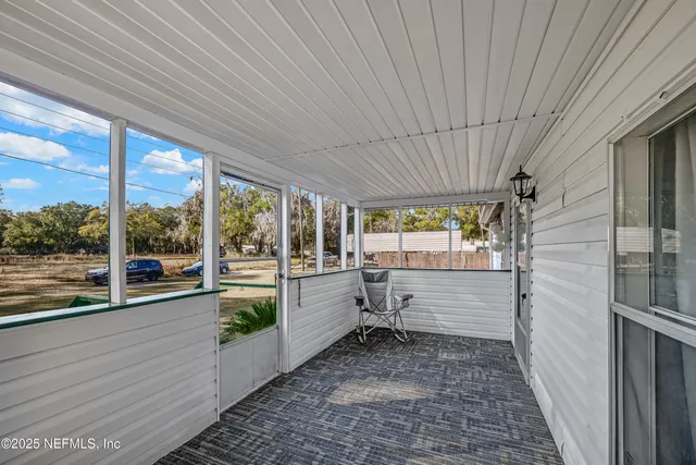 a bathroom with a large window