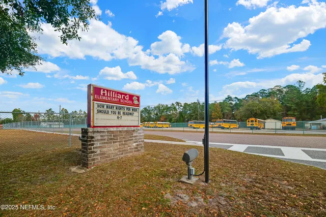 a view of a street with an trees