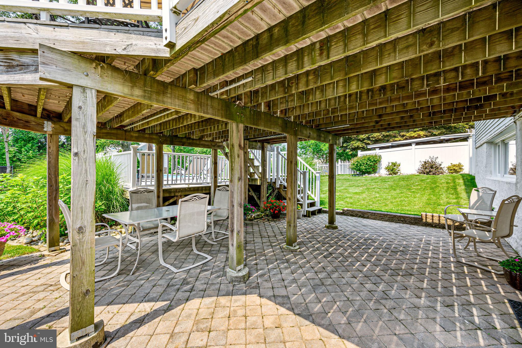 300 Parham Road Springfield, PA 19064 - Photo 37 of 45 Paver patio with entry to basement