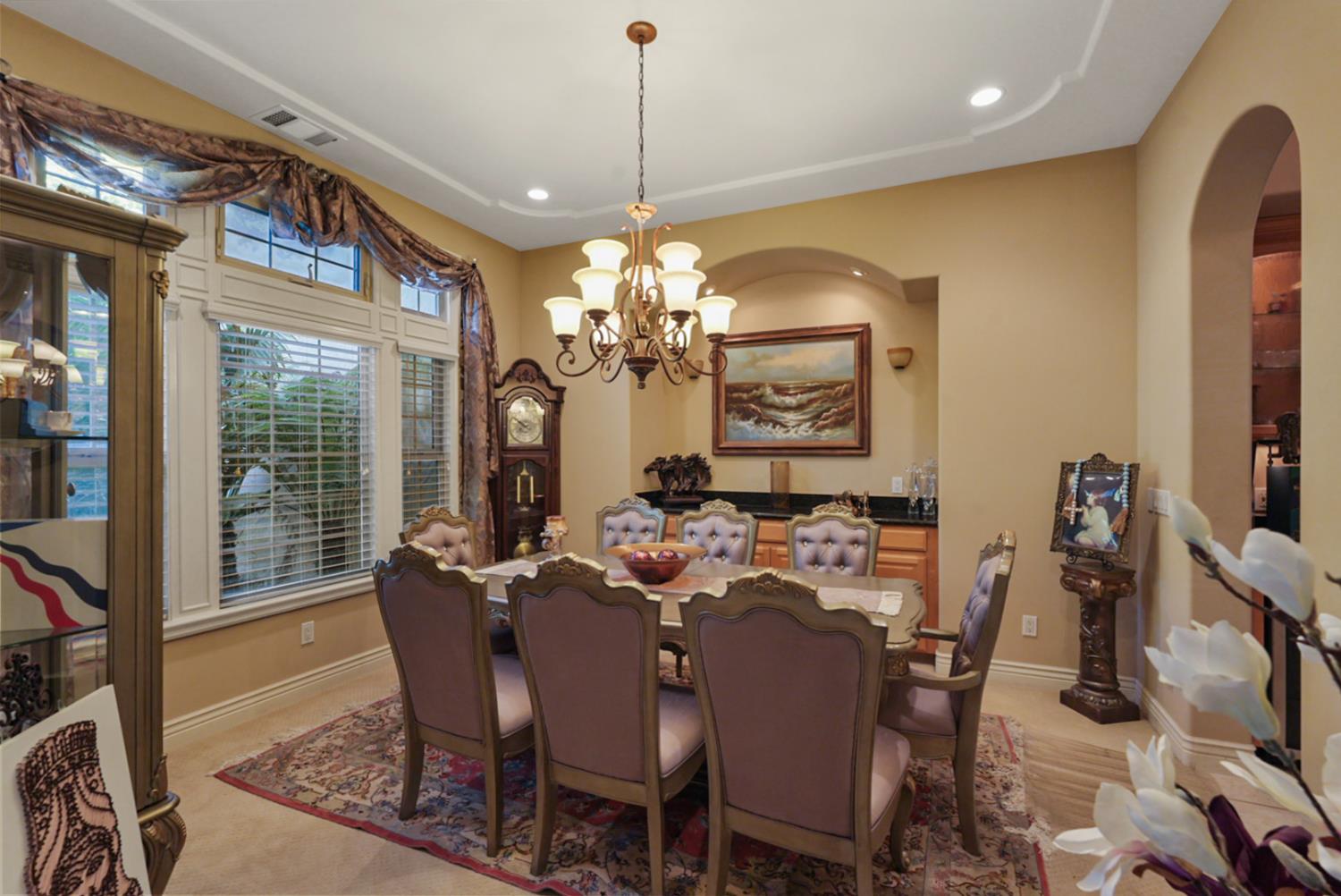 2575 Kensington Court Turlock, CA 95382 - Photo 11 of 62 a view of a dining room with furniture window and outside view