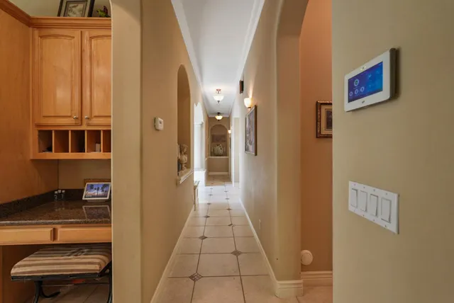 a view of an entryway with a workspace