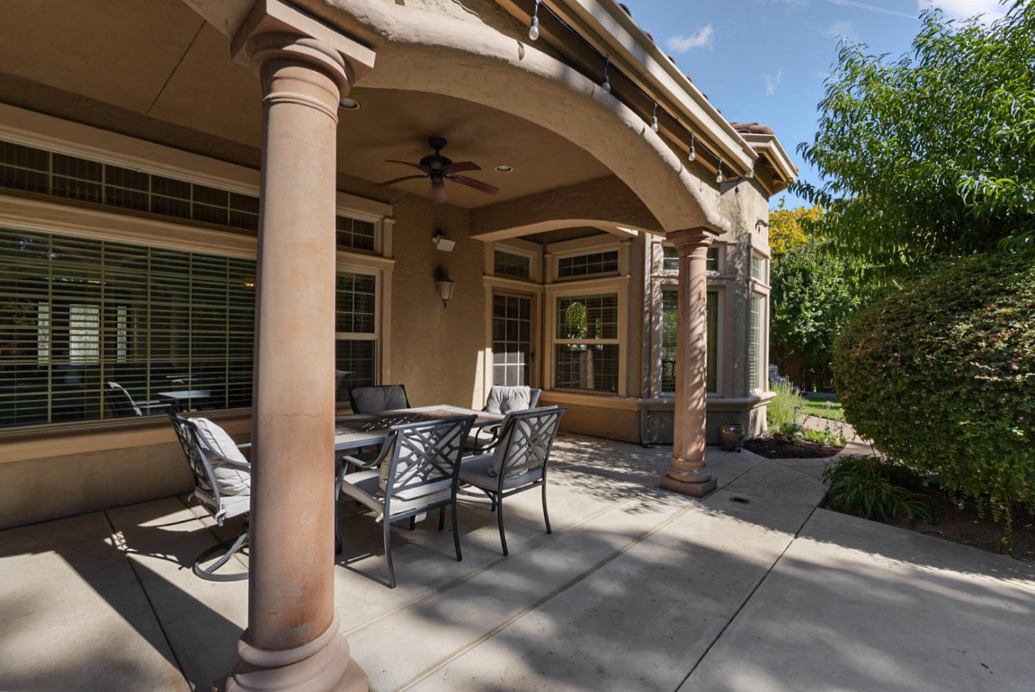2575 Kensington Court Turlock, CA 95382 - Photo 36 of 62 a view of a patio with table and chairs and potted plants