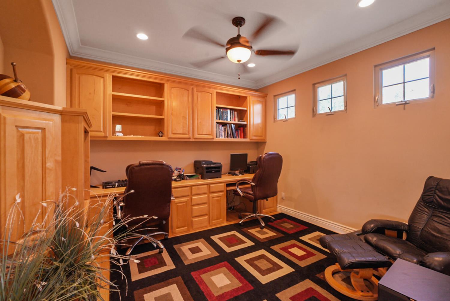 2575 Kensington Court Turlock, CA 95382 - Photo 39 of 62 a workspace with wooden floor and a workspace