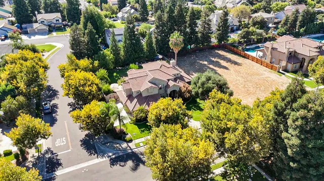 a view of outdoor space with wooden fence