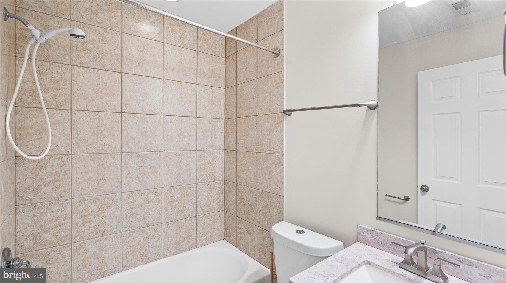 847 Carroll Street Baltimore, MD 21230 - Photo 17 of 33 Modern bathroom with elegant tiles.