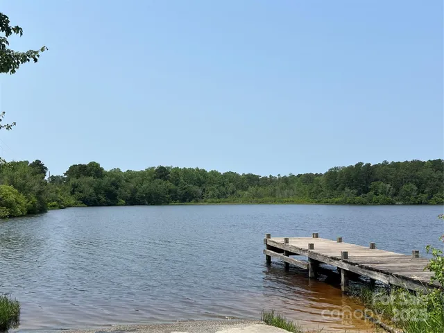 a view of a lake with mountain in the background