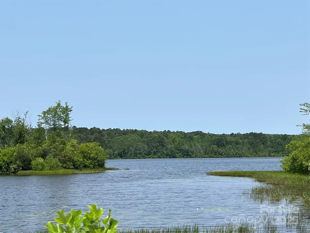 a view of lake with mountain in background