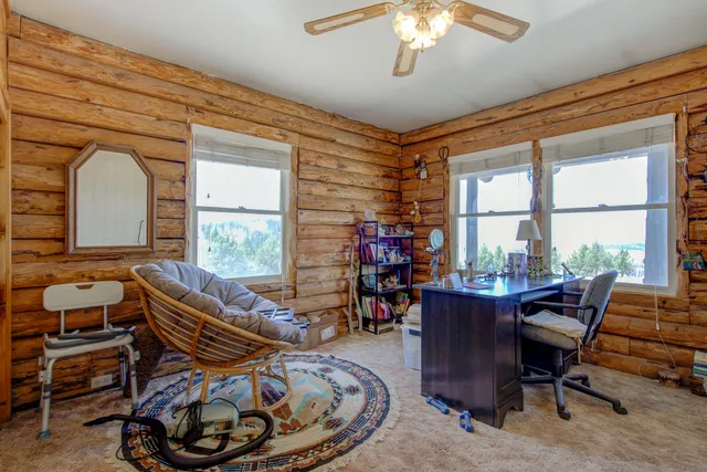 a room with furniture and a window