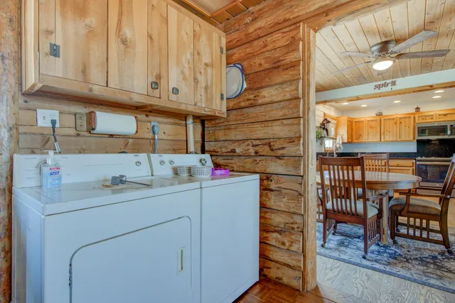 a kitchen with a sink cabinets and appliances