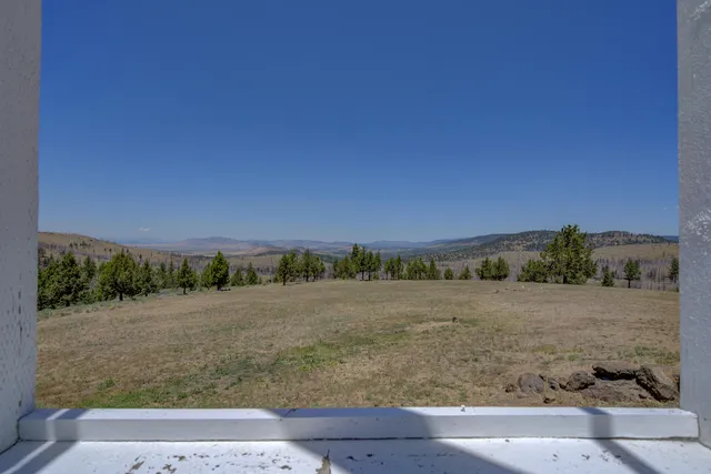 a view of a road with an ocean view