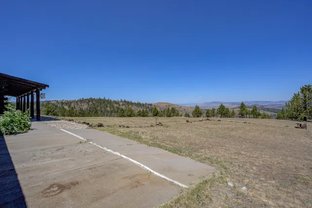 a view of a road with an ocean view