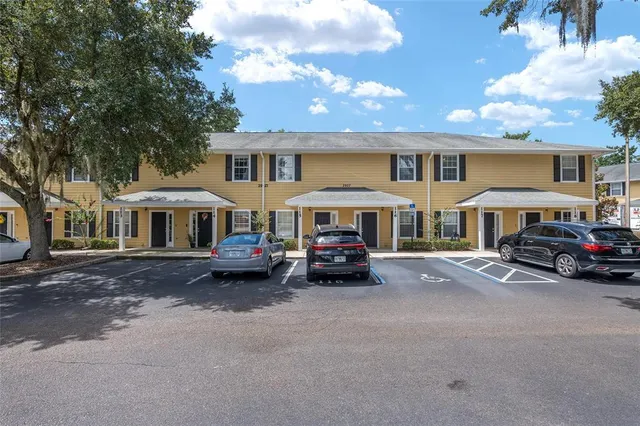 a car parked in front of a house