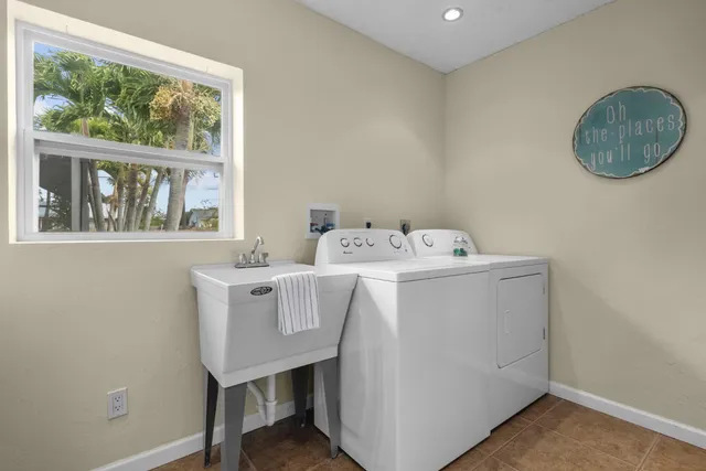 a utility room with dryer and washer