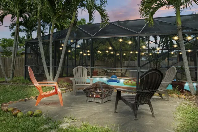 a patio with table and chairs