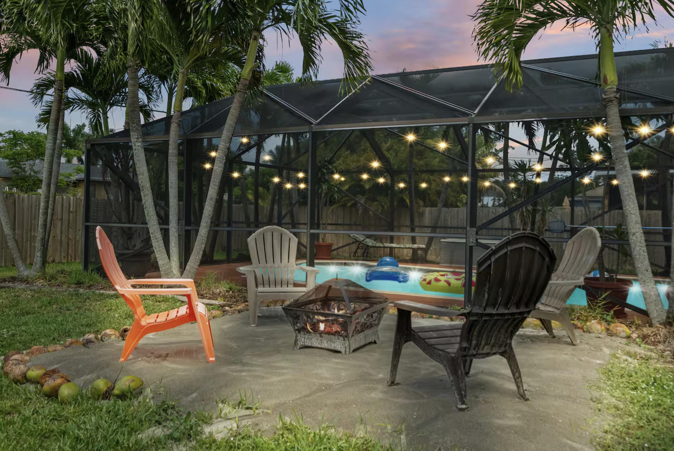 991 Southeast Walters Terrace Port St. Lucie, FL 34983 - Photo 3 of 19 a patio with table and chairs