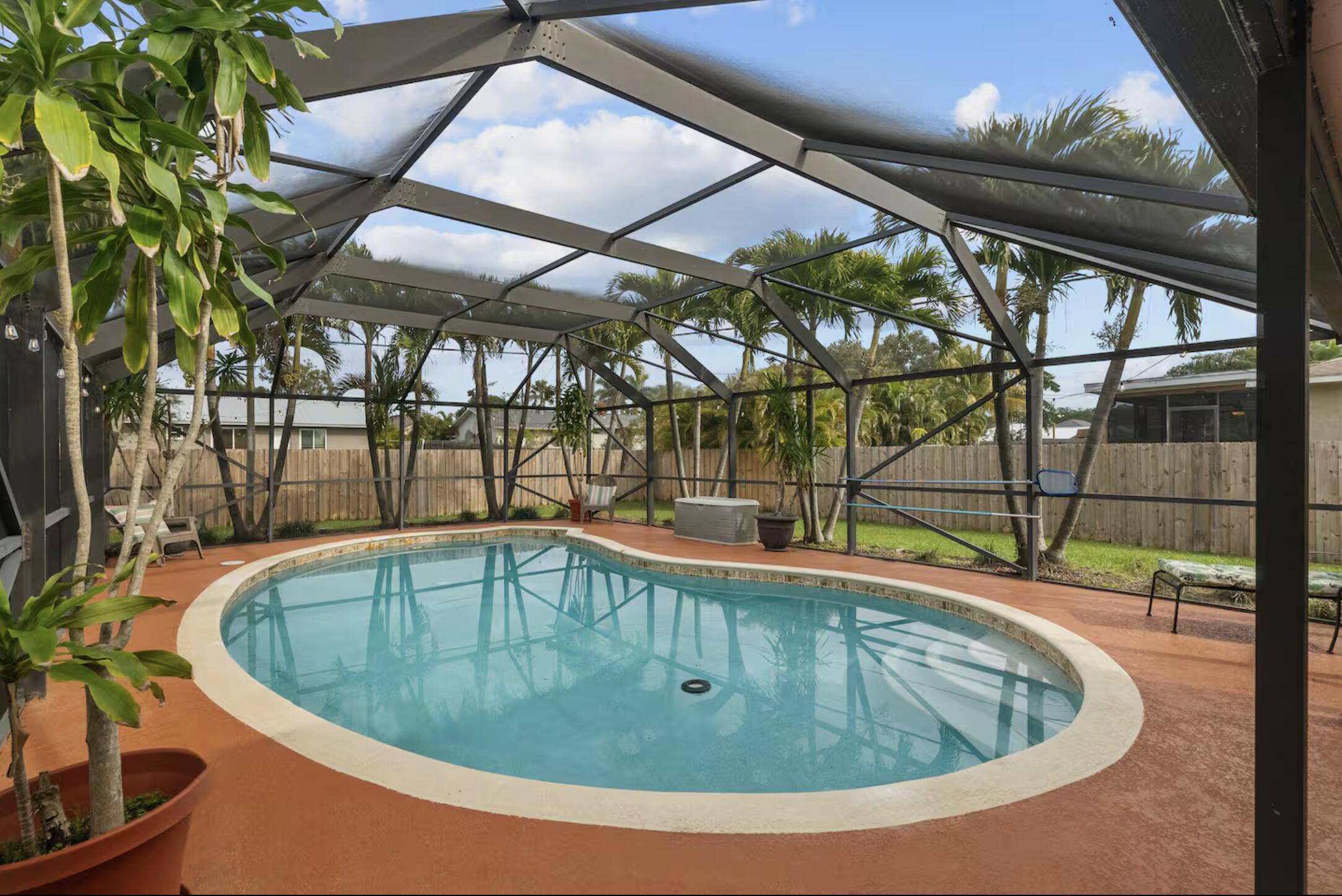 991 Southeast Walters Terrace Port St. Lucie, FL 34983 - Photo 5 of 19 a view of a indoor swimming pool