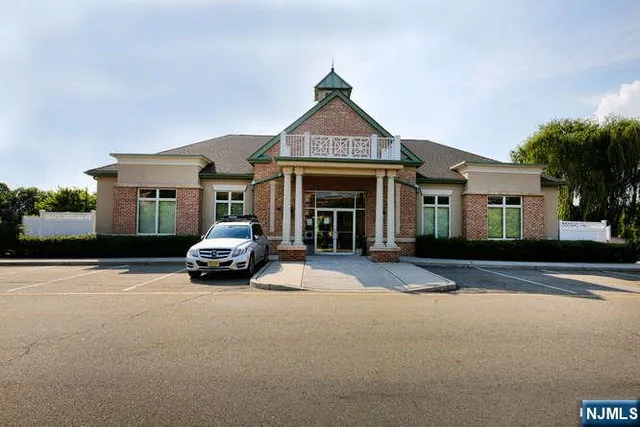 a car parked in front of a house