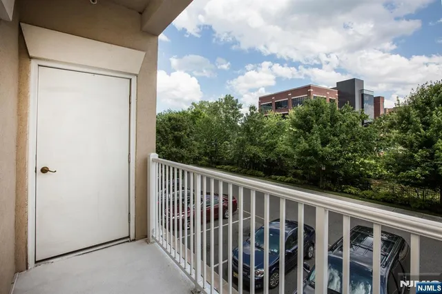 an aerial view of a house with a garden and a yard