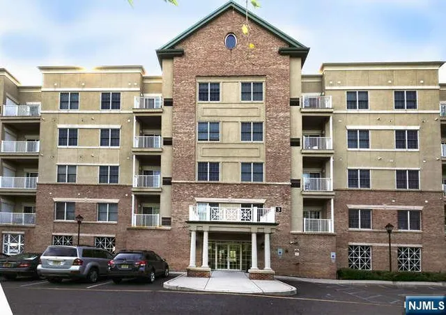 a view of a car parked in front of a building