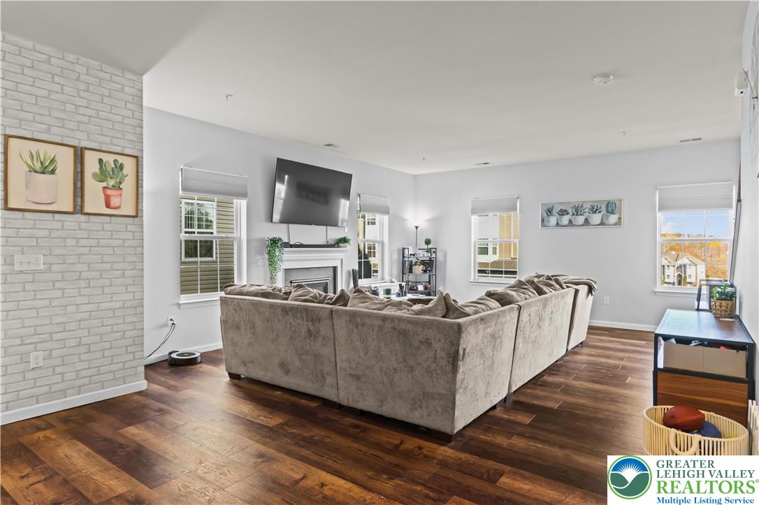 2260 Rising Hill Road Whitehall, PA 18052 - Photo 18 of 30 a living room with furniture and a fireplace