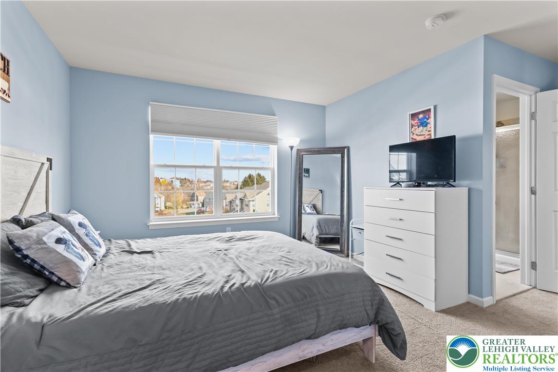 2260 Rising Hill Road Whitehall, PA 18052 - Photo 20 of 30 a bedroom with a bed and a television