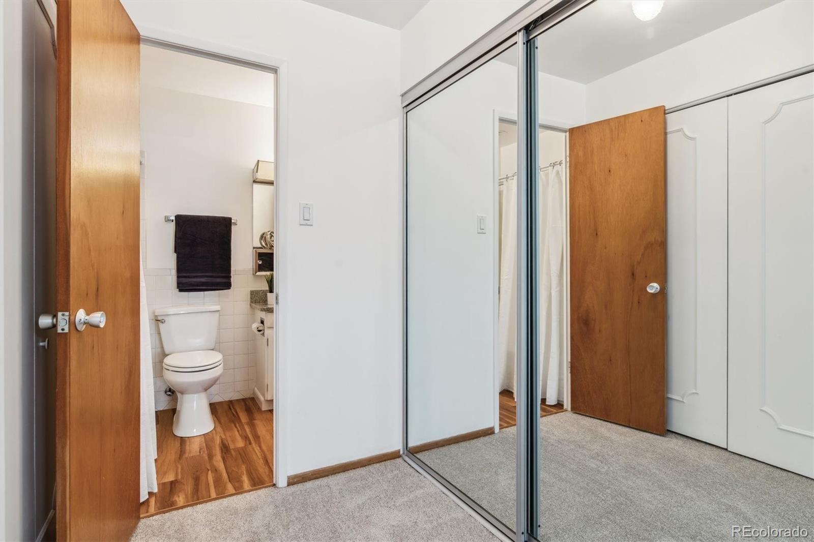 610 South Alton Way, Unit 8D Denver, CO 80247 - Photo 16 of 50 a view of a bathroom with toilet