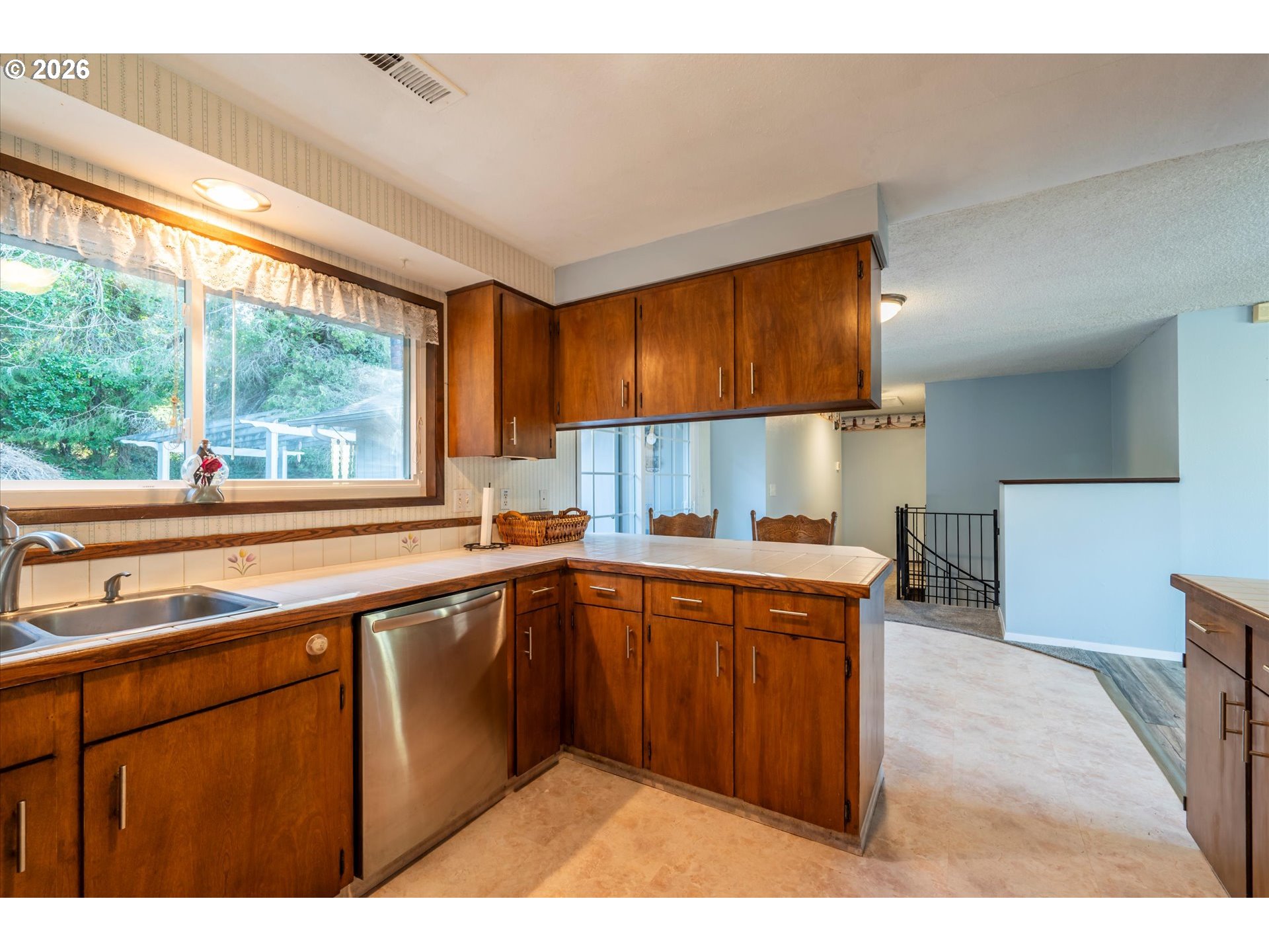 1376 D Street Coos Bay, OR 97420 - Photo 14 of 44 a kitchen with a sink stove and cabinets