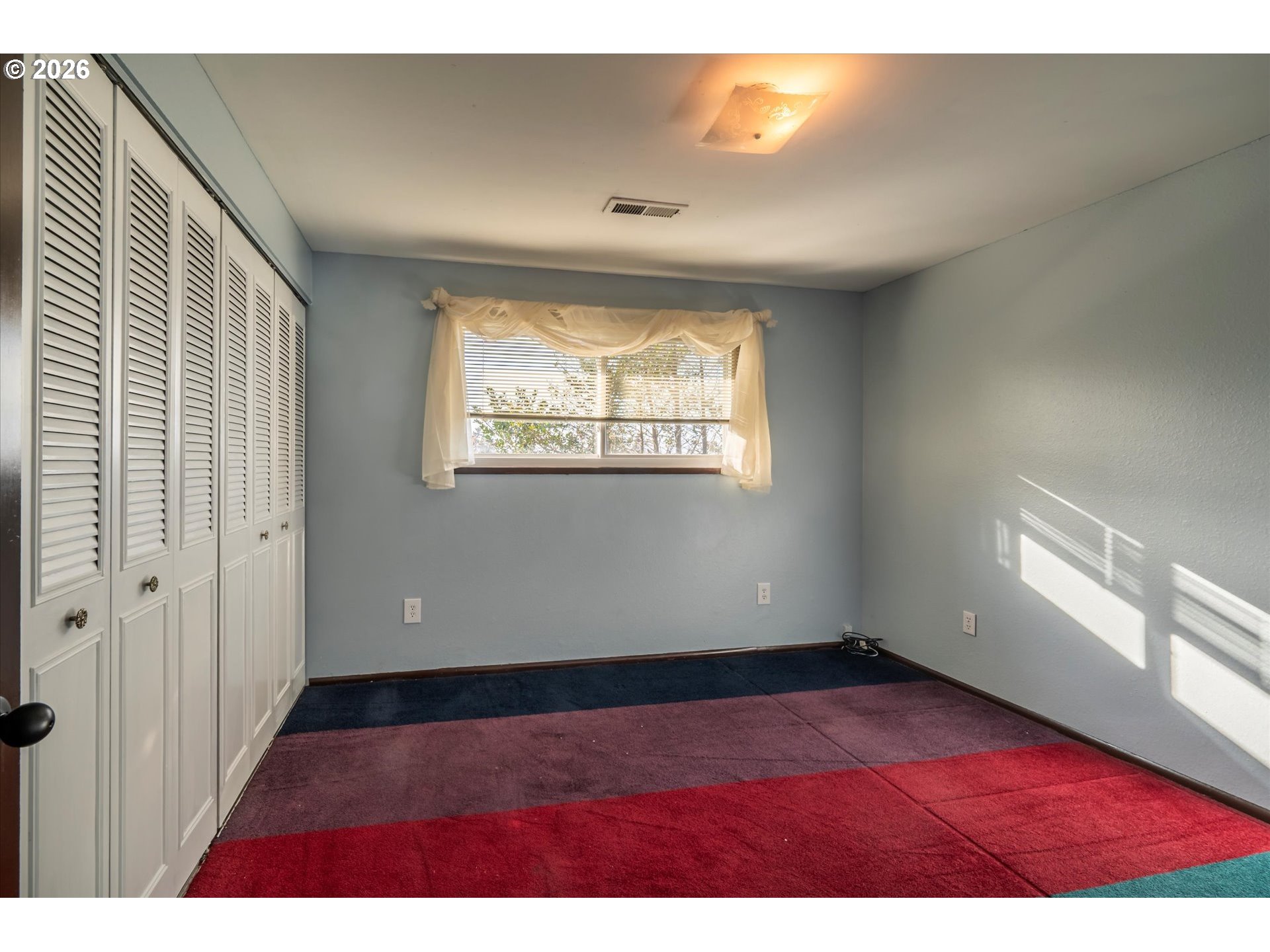 1376 D Street Coos Bay, OR 97420 - Photo 22 of 44 a view of an empty room and window