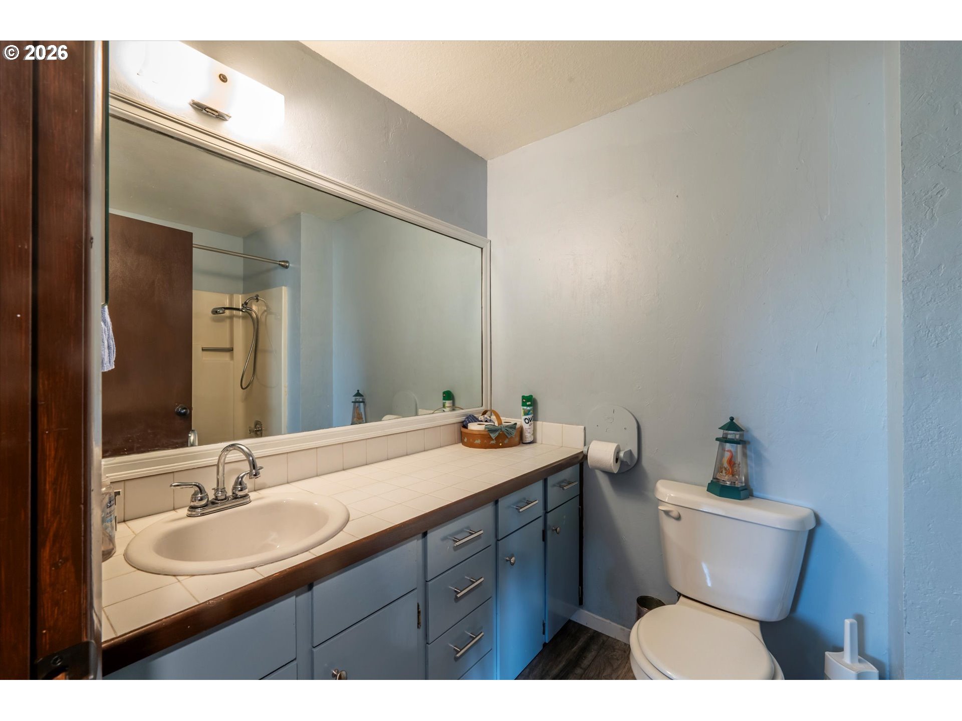1376 D Street Coos Bay, OR 97420 - Photo 24 of 44 a bathroom with a sink and a mirror