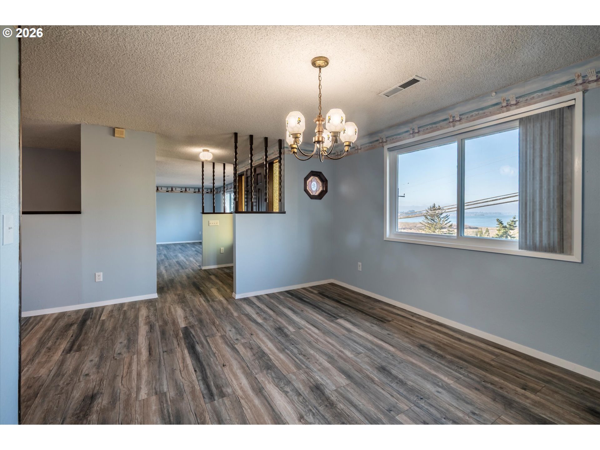 1376 D Street Coos Bay, OR 97420 - Photo 27 of 44 a view of empty room with wooden floor