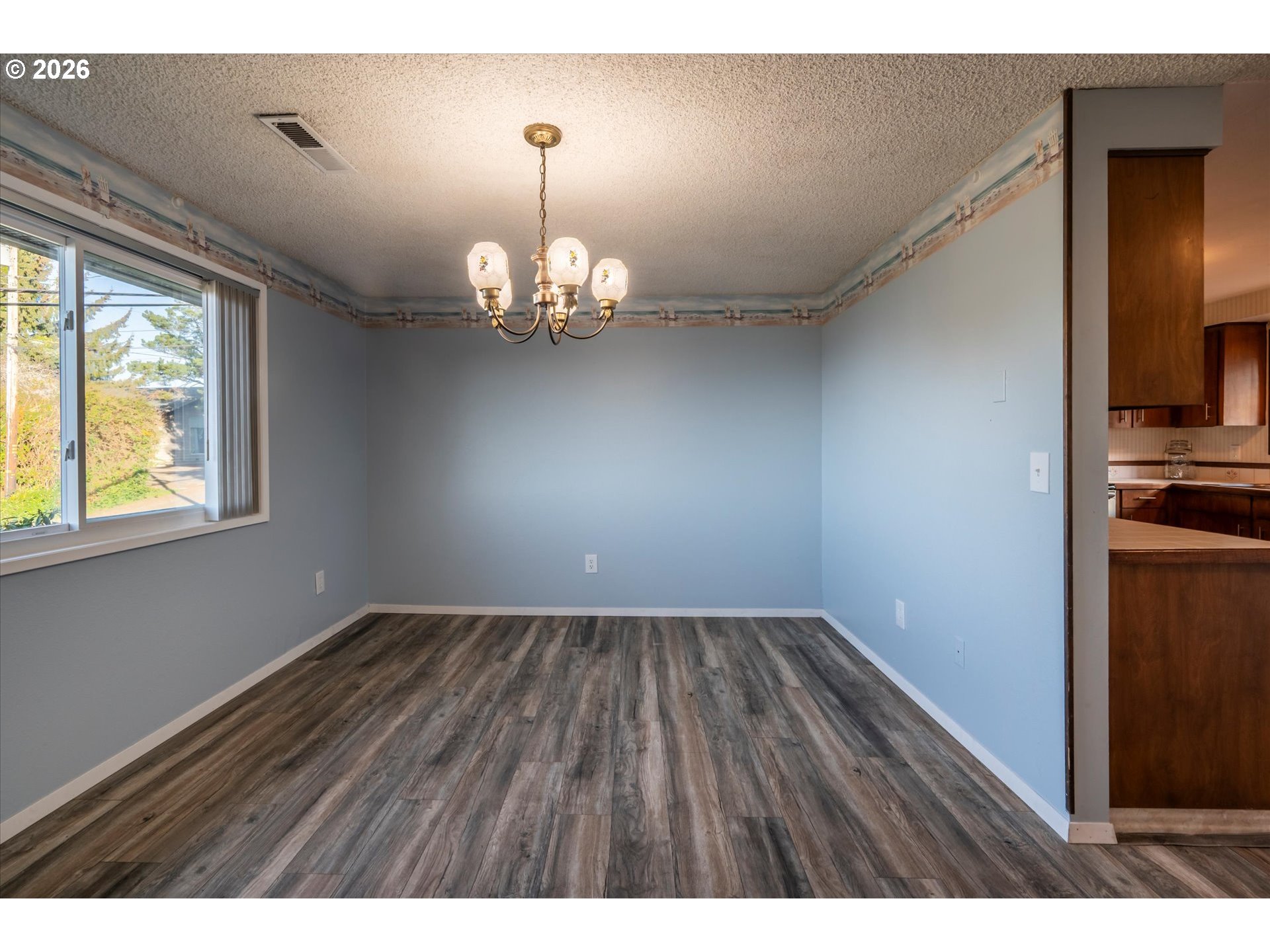 1376 D Street Coos Bay, OR 97420 - Photo 28 of 44 a view of empty room with wooden floor