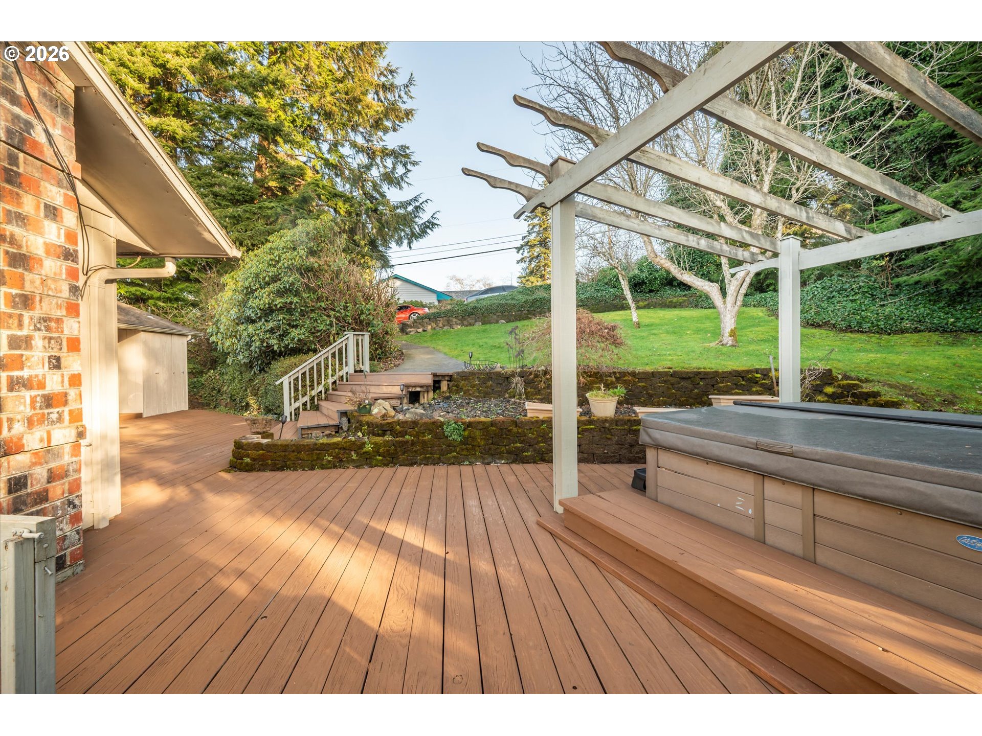 1376 D Street Coos Bay, OR 97420 - Photo 3 of 44 a view of a patio with table and chairs and wooden floor