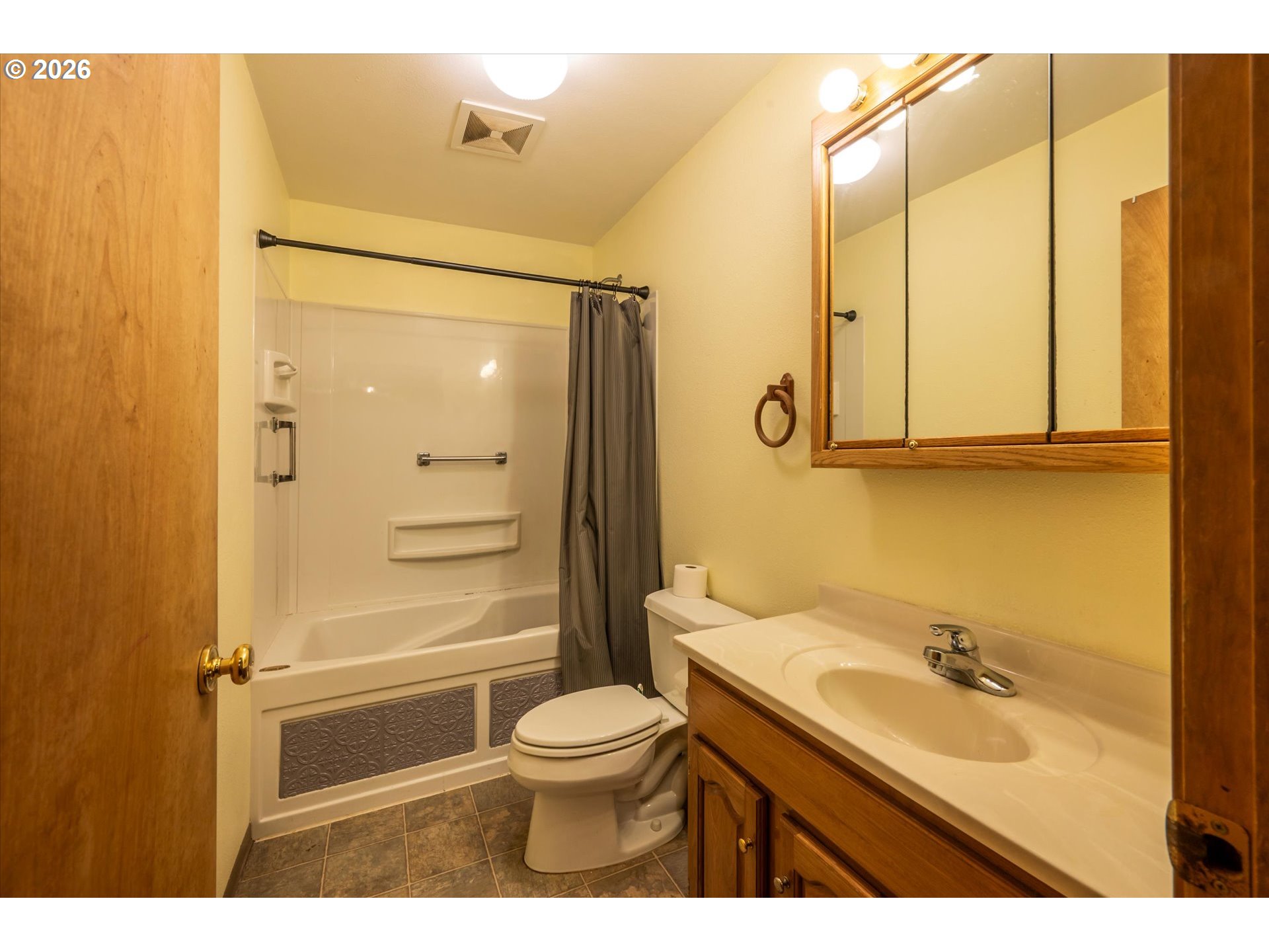 1376 D Street Coos Bay, OR 97420 - Photo 33 of 44 a bathroom with a sink a toilet and shower