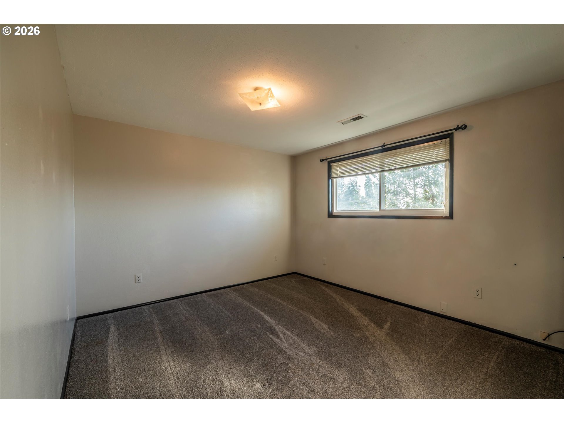 1376 D Street Coos Bay, OR 97420 - Photo 35 of 44 a view of an empty room with a window