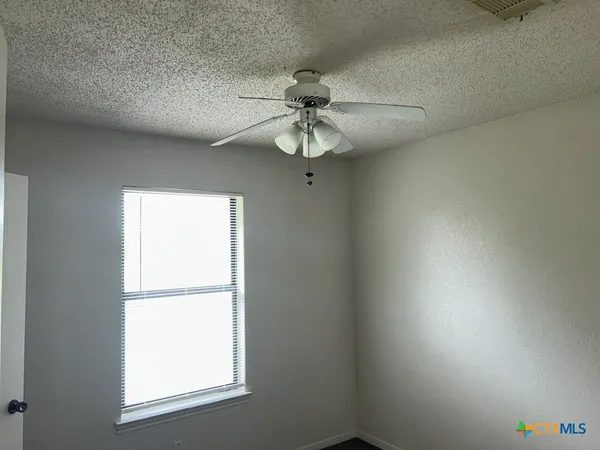 a window in an empty room