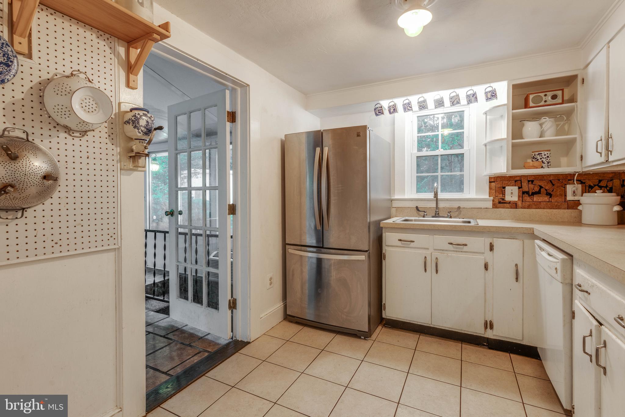 1801 Stringtown Road Sparks Glencoe, MD 21152 - Photo 12 of 26 a kitchen with a refrigerator and a sink