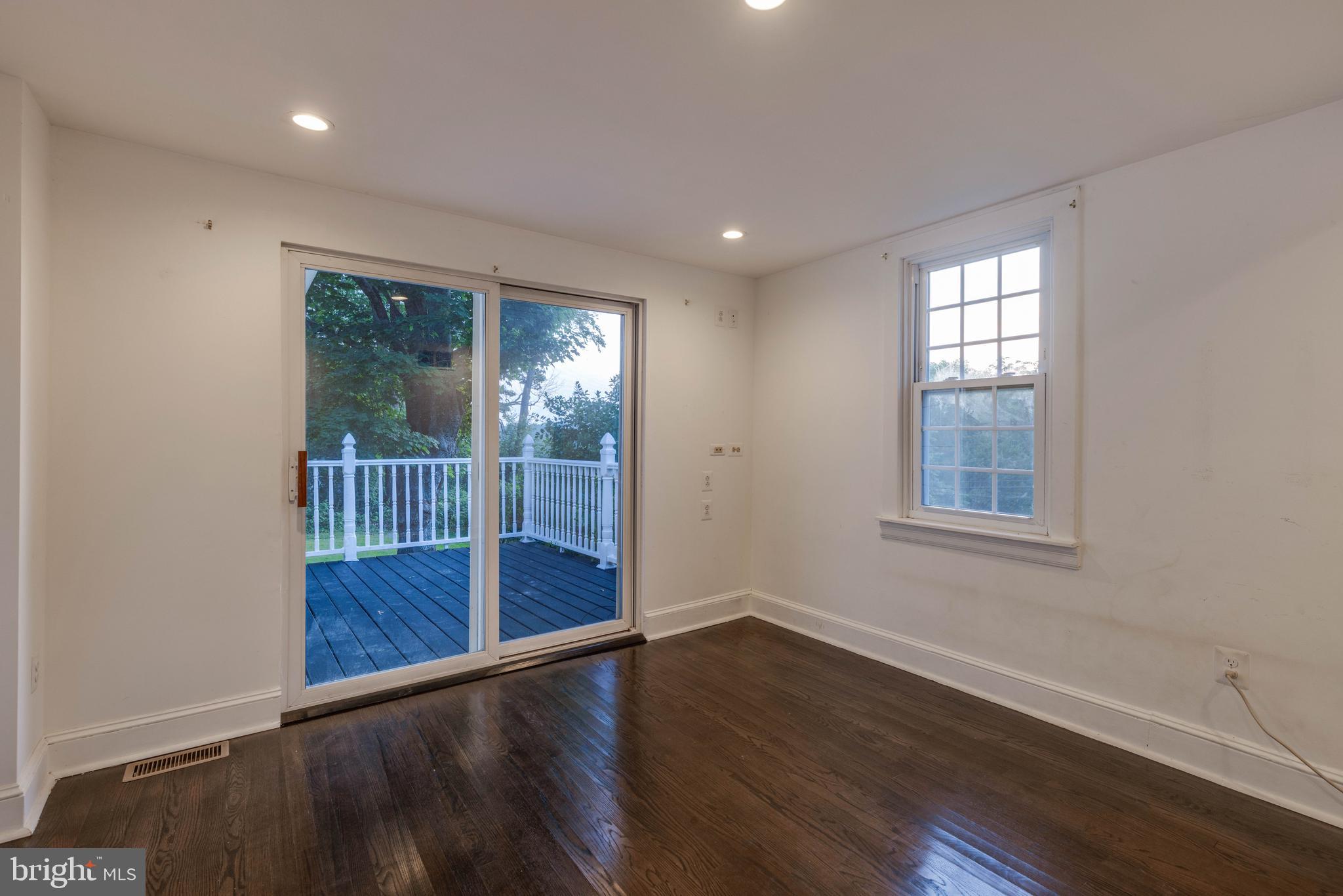 1801 Stringtown Road Sparks Glencoe, MD 21152 - Photo 15 of 26 wooden floor in an empty room with a window